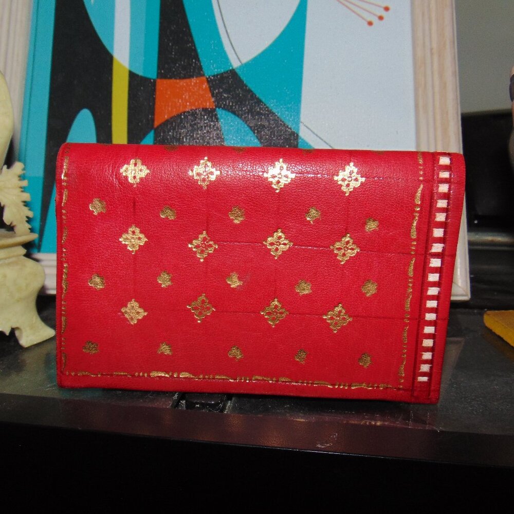 Vintage womens red leather 22 carat gold embossed gold slim bifold wallet tooled